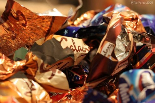 Workers wearing PPE and loading a van safely during a clearance
